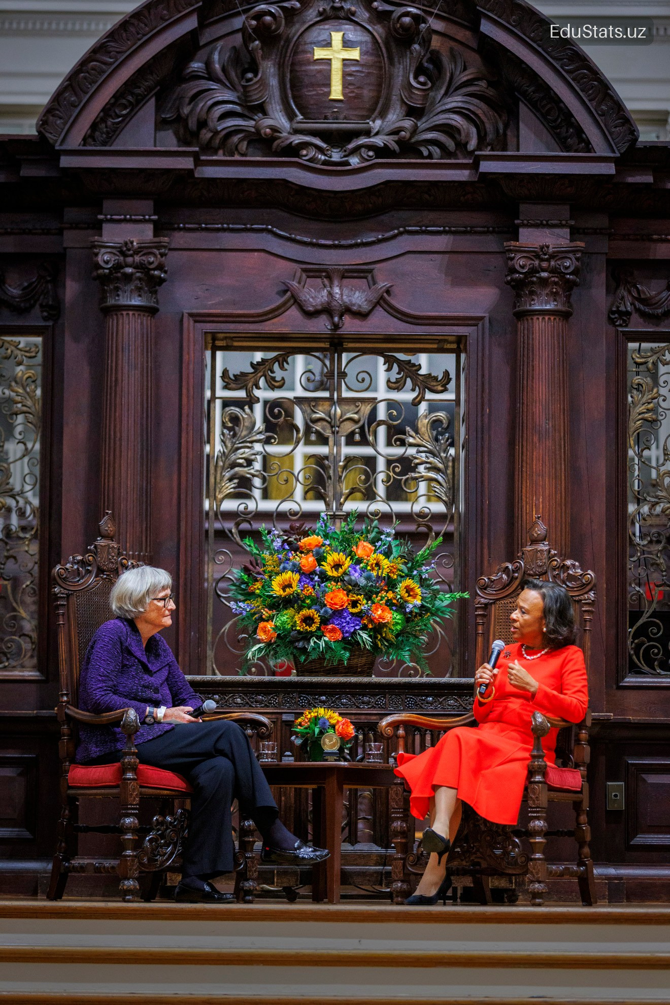 Former Harvard President Drew Faust and Johnson speak during the event.